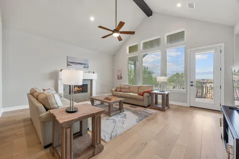 a kitchen with stainless steel appliances a stove microwave and a refrigerator