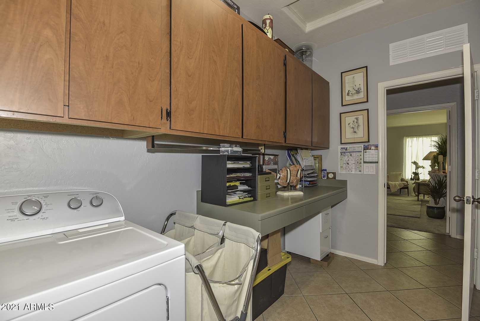 2638 East Ridge Creek Road Phoenix, AZ 85024 - Photo 49 of 57 Laundry Room-Desk