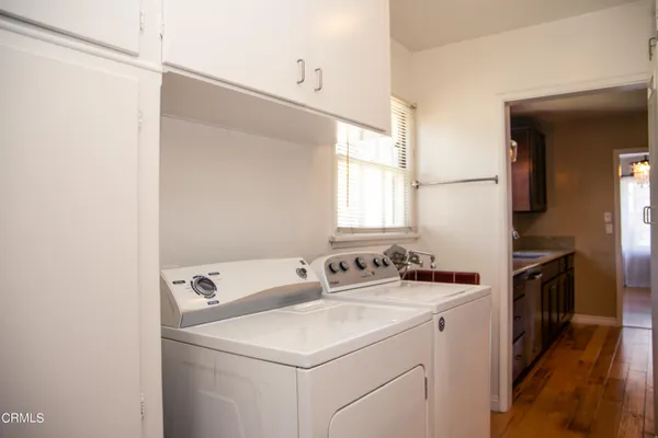 a utility room with dryer and washer