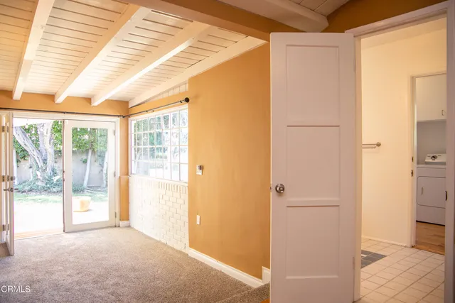 a view of a room with an entryway