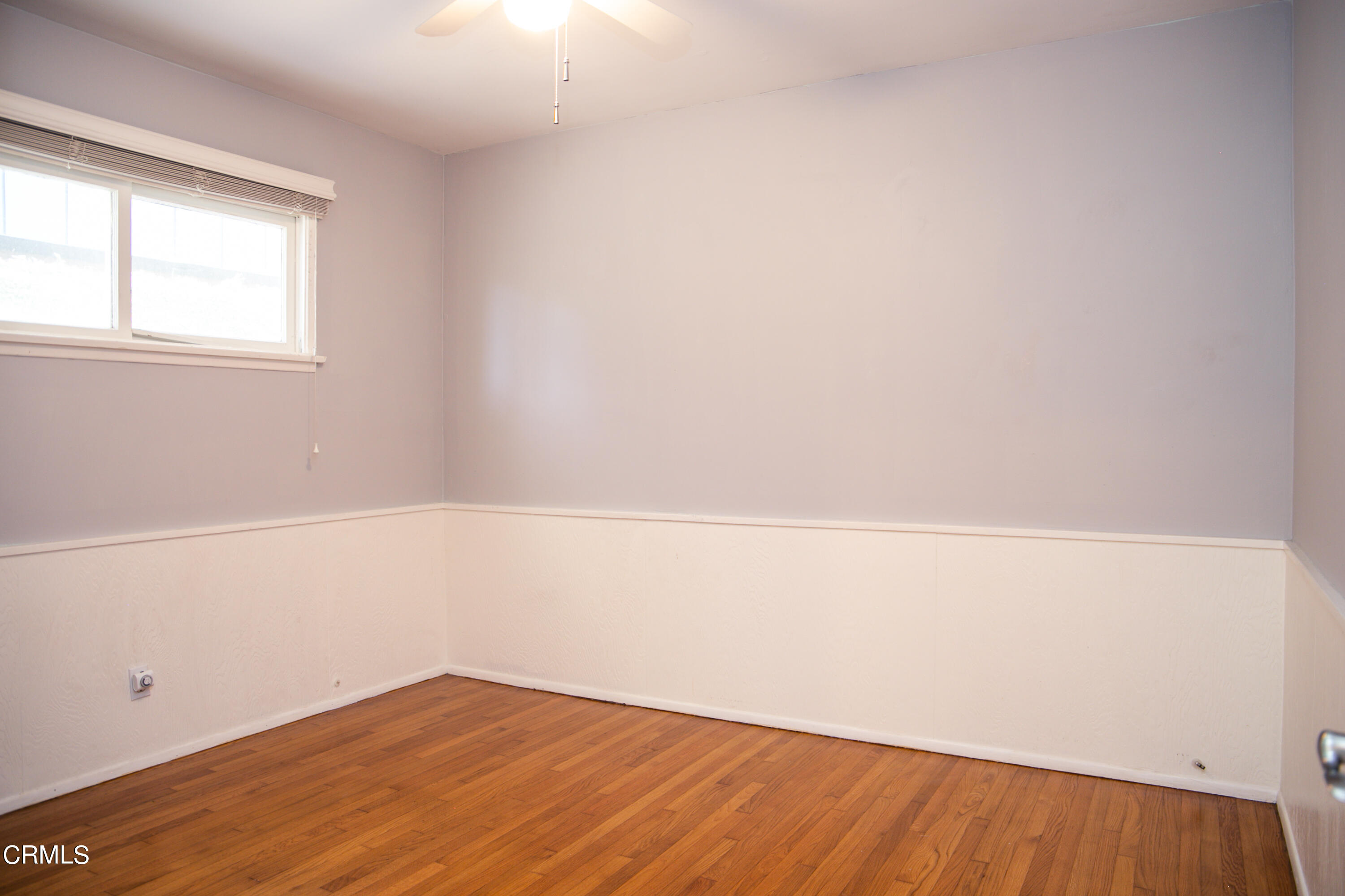 7601 Flight Avenue Los Angeles, CA 90045 - Photo 22 of 36 a view of an empty room with wooden floor and a window