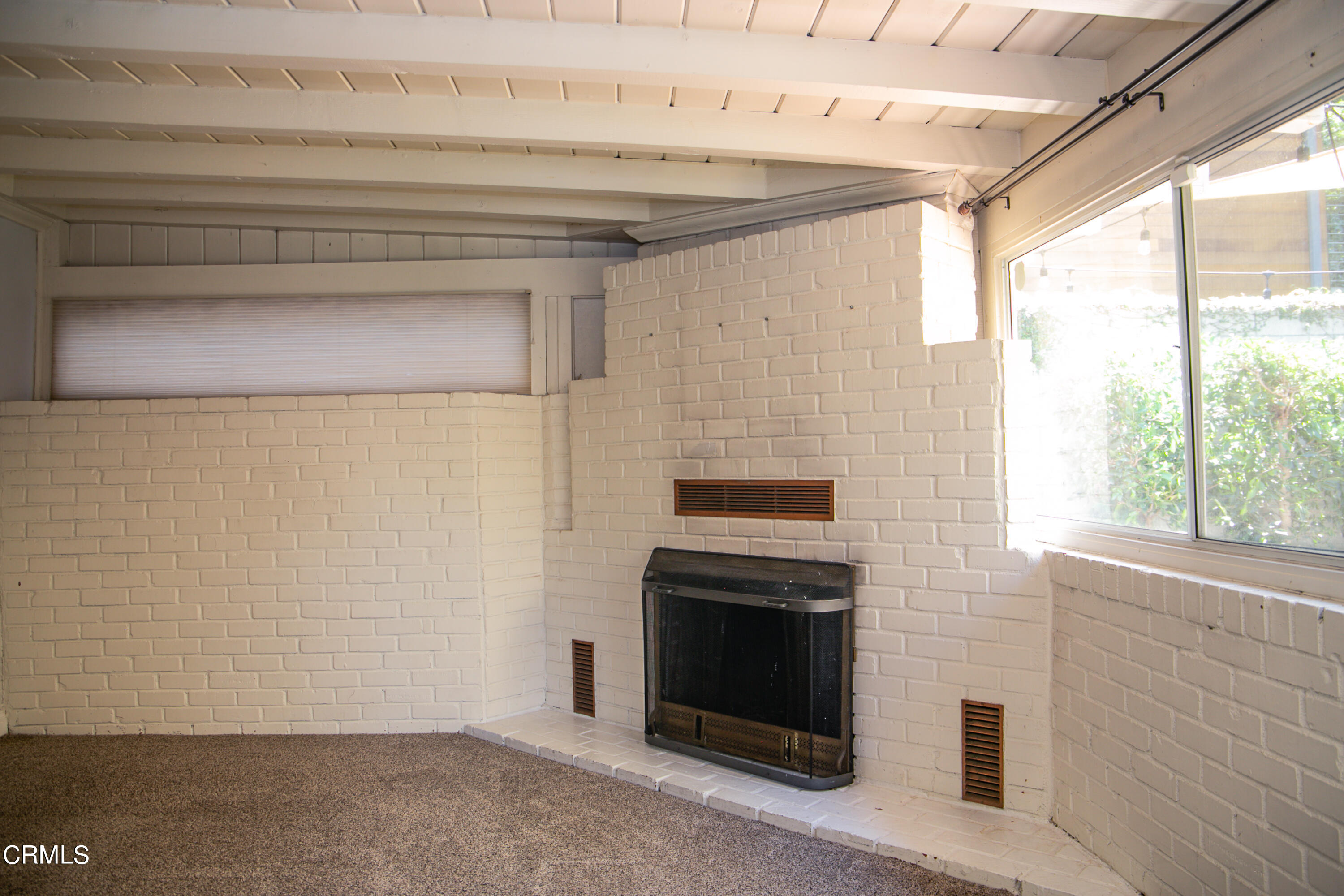 7601 Flight Avenue Los Angeles, CA 90045 - Photo 23 of 36 a view of empty room with a fireplace and a window