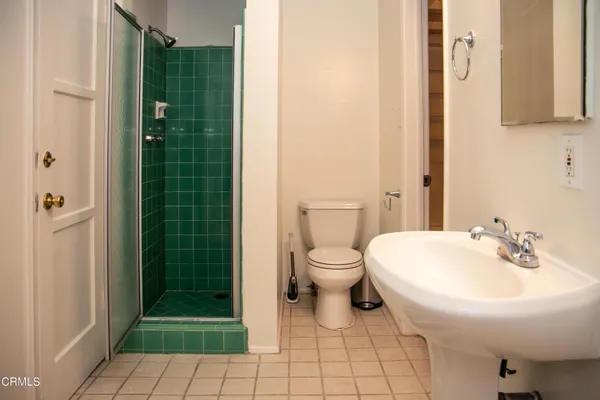 a bathroom with a toilet and a sink