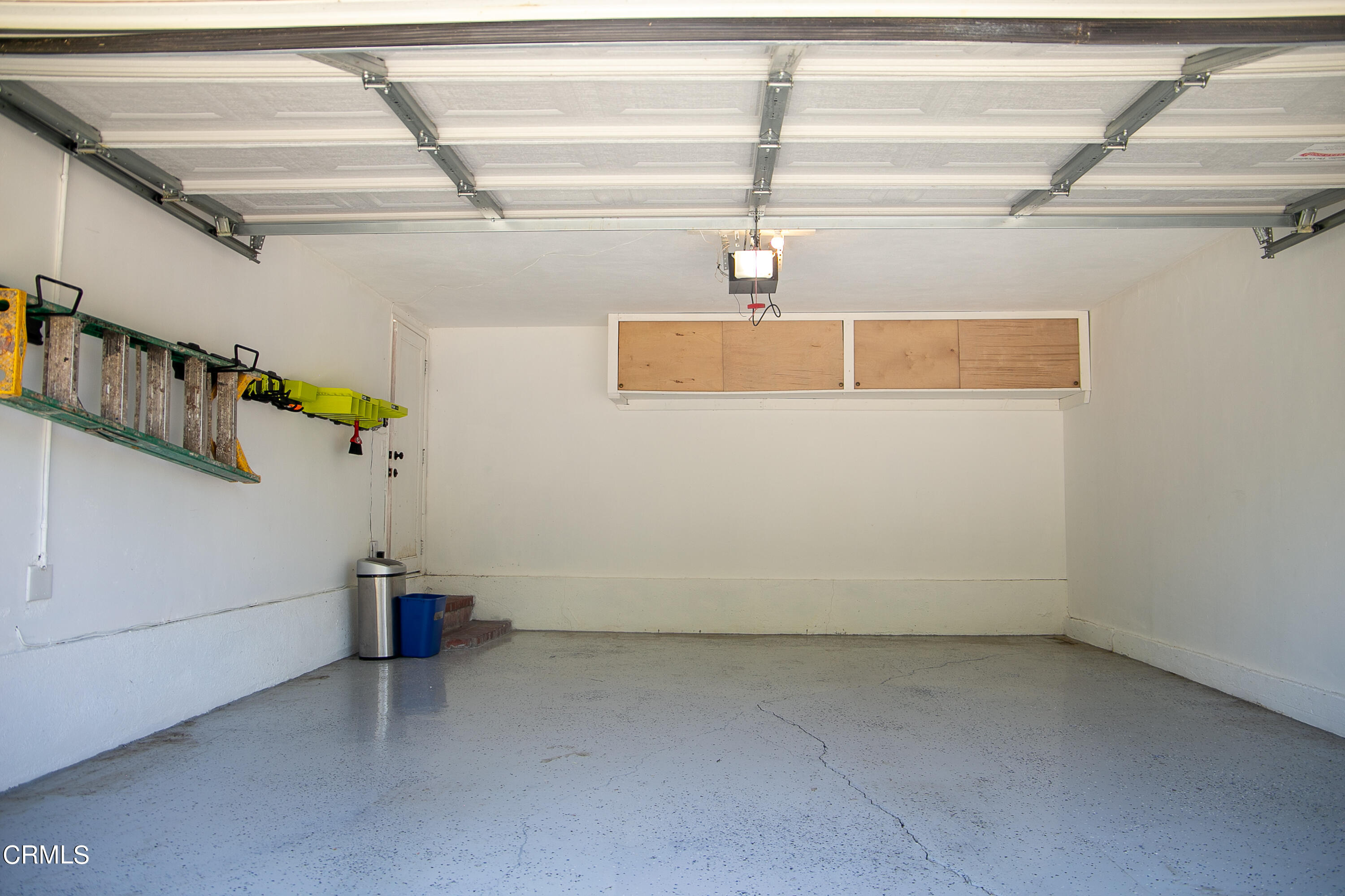 7601 Flight Avenue Los Angeles, CA 90045 - Photo 27 of 36 a view of storage and utility room with racks on the wall