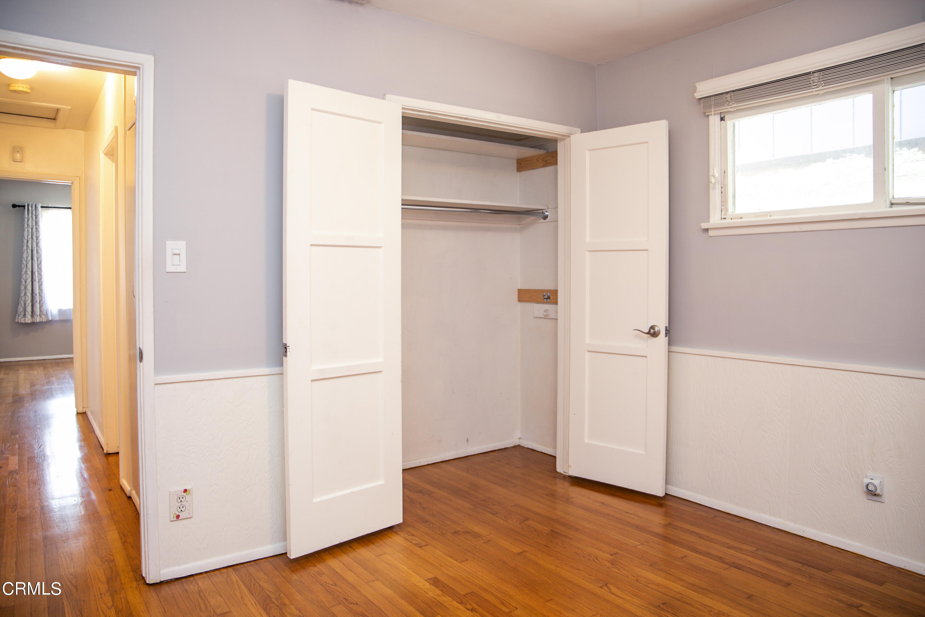 7601 Flight Avenue Los Angeles, CA 90045 - Photo 29 of 36 a view of an empty room with wooden floor and a window