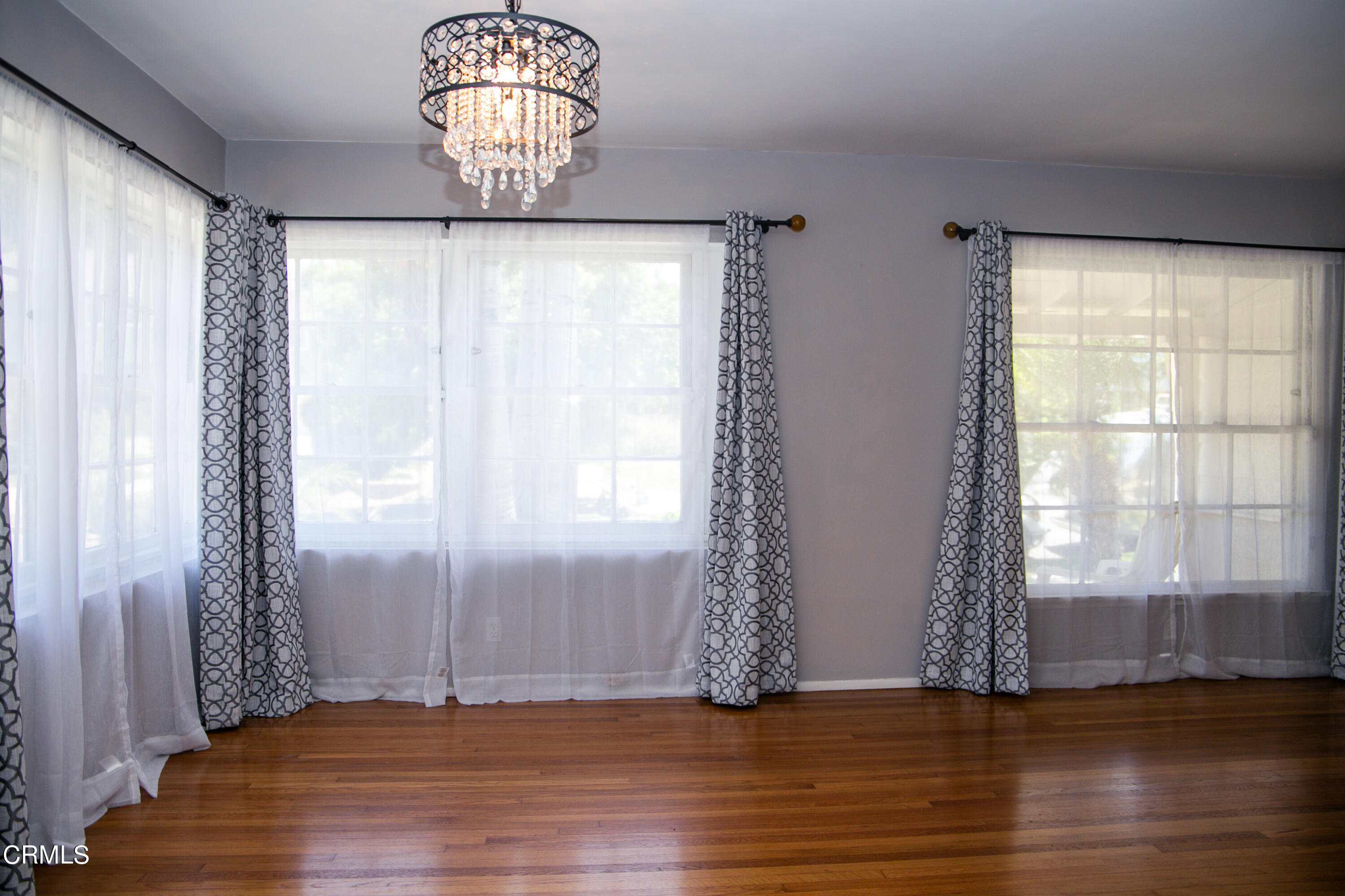 7601 Flight Avenue Los Angeles, CA 90045 - Photo 7 of 36 a view of empty room with wooden floor and fan