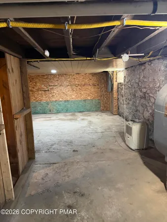 a view of storage and utility room