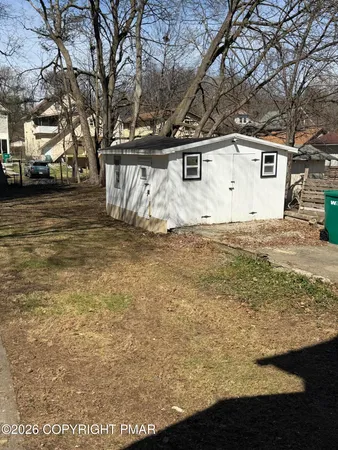 a view of yard with trees