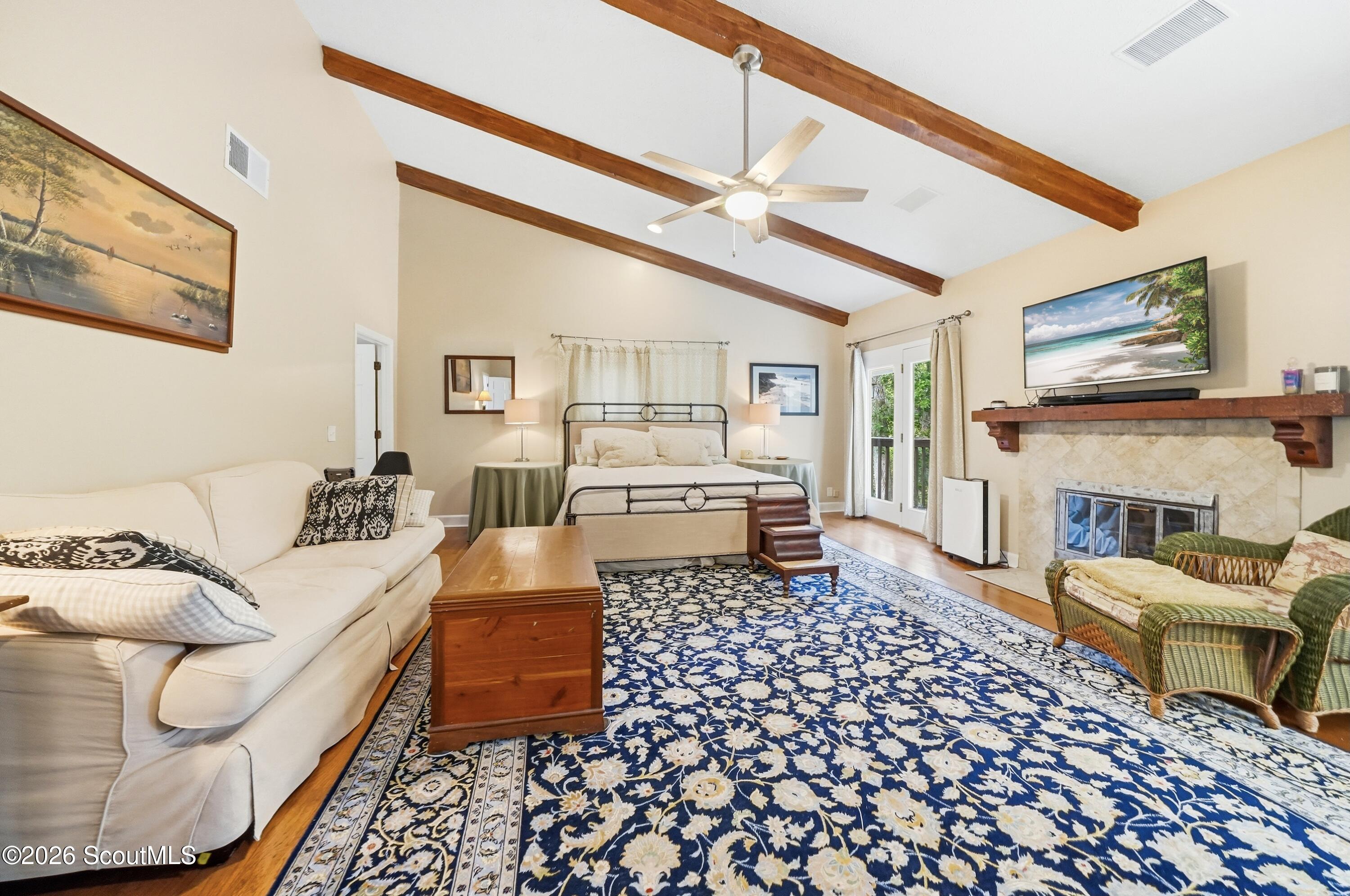 109 Tall Pine Road St. Simons Island, GA 31522 - Photo 26 of 50 The spacious primary suite features fireplace