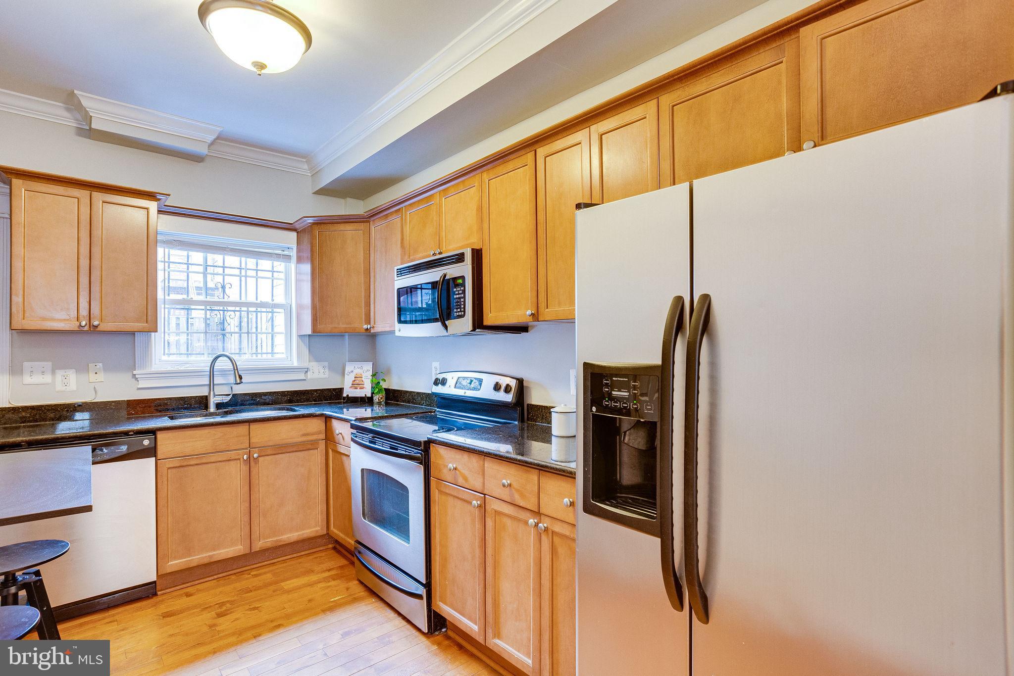 1656 Kramer Street Northeast Washington, DC 20002 - Photo 6 of 20 Stainless and granite finishes in the kitchen