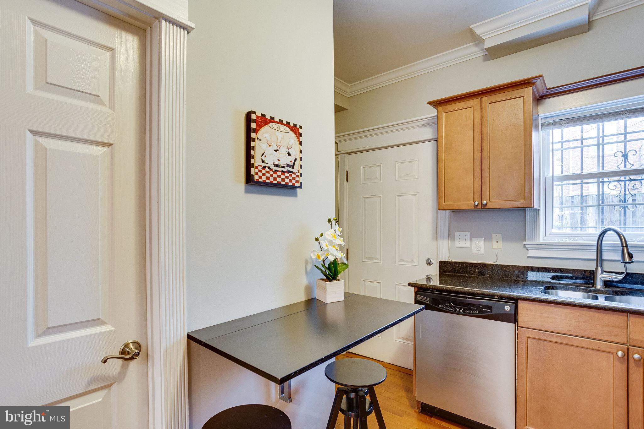 1656 Kramer Street Northeast Washington, DC 20002 - Photo 7 of 20 Stainless and granite finishes in the kitchen