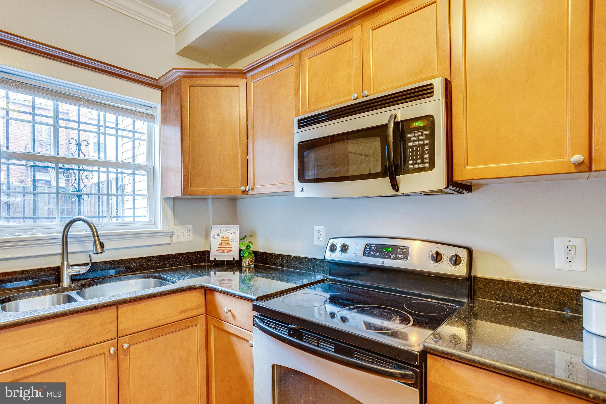 1656 Kramer Street Northeast Washington, DC 20002 - Photo 8 of 20 Stainless and granite finishes in the kitchen