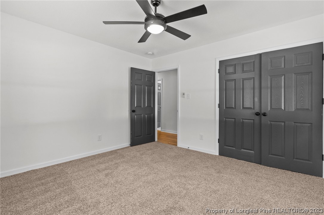 4659 Tabor Church Road Fayetteville, NC 28312 - Photo 18 of 50 a view of empty room with ceiling fan