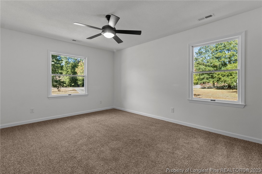 4659 Tabor Church Road Fayetteville, NC 28312 - Photo 19 of 50 a view of an empty room with a window