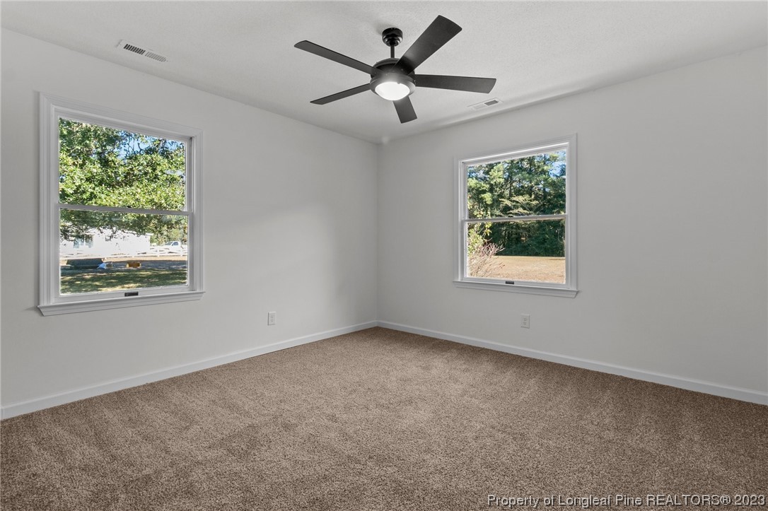 4659 Tabor Church Road Fayetteville, NC 28312 - Photo 26 of 50 a view of an empty room with a window