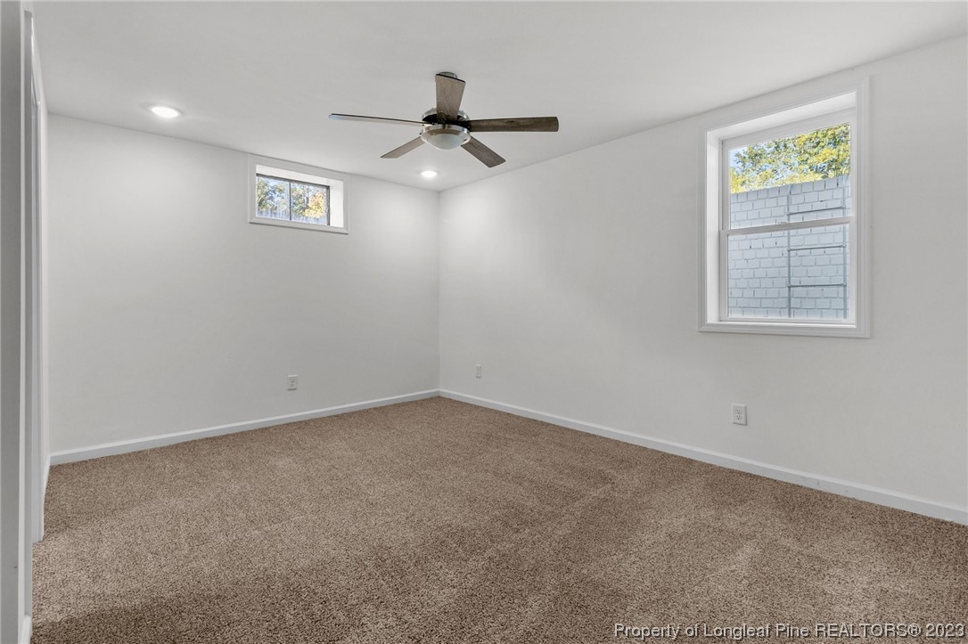 4659 Tabor Church Road Fayetteville, NC 28312 - Photo 33 of 50 an empty room with windows