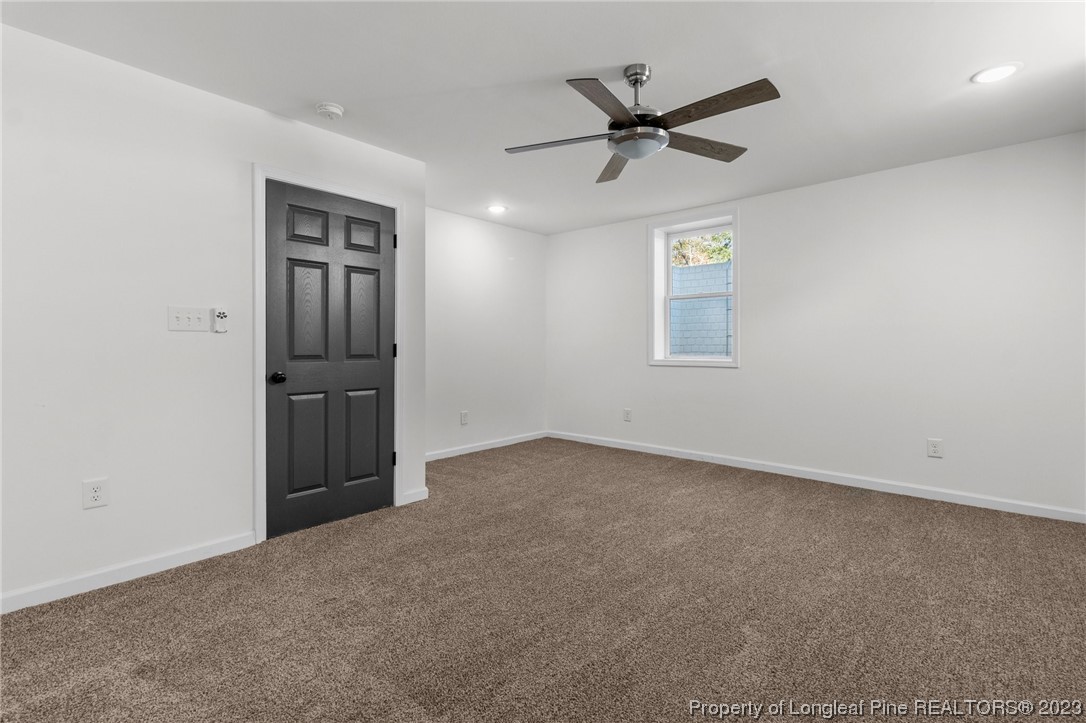 4659 Tabor Church Road Fayetteville, NC 28312 - Photo 34 of 50 an empty room with closet and windows