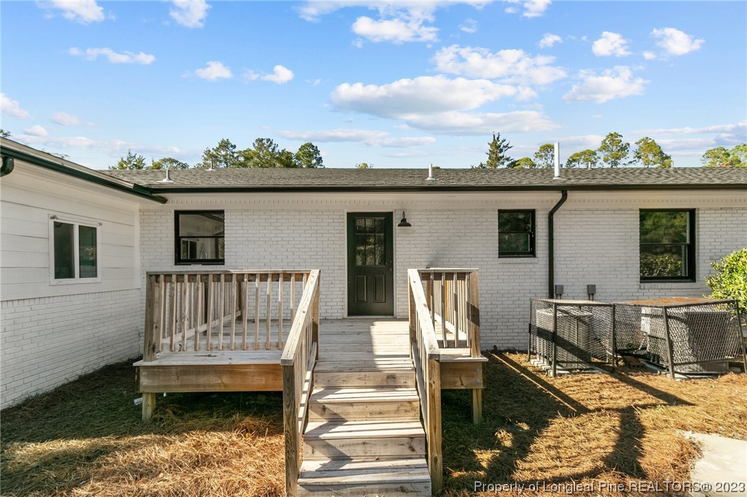 4659 Tabor Church Road Fayetteville, NC 28312 - Photo 47 of 50 a view of house with backyard porch and furniture