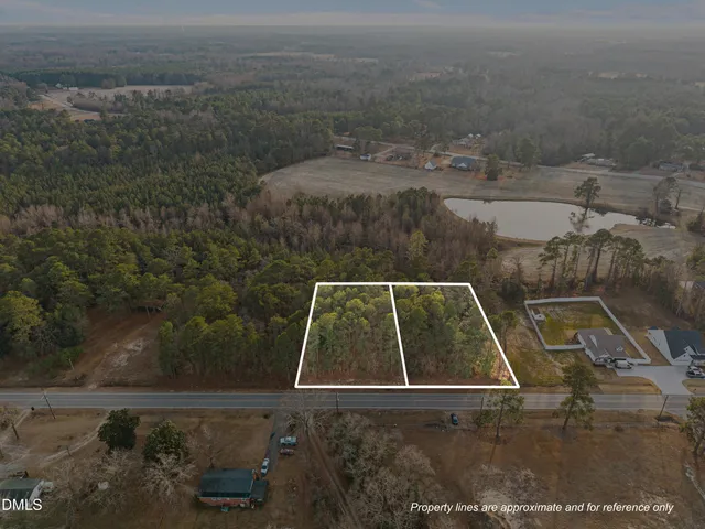 a view of roof with small yard