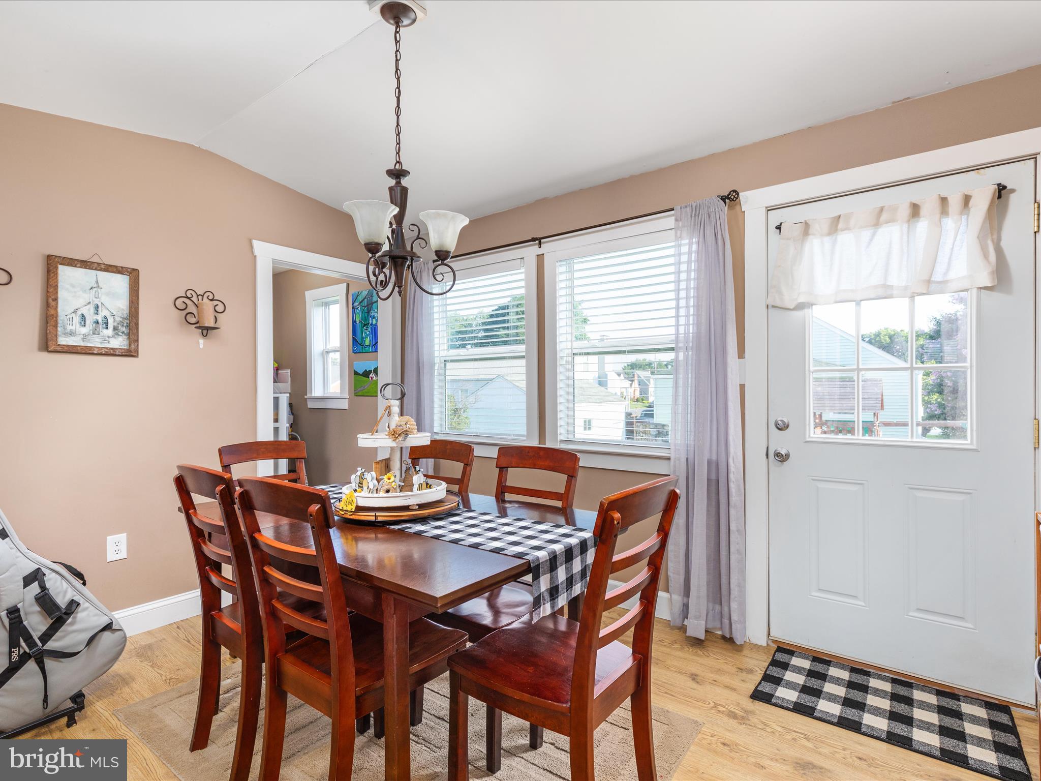 702 Braxton Road Front Royal, VA 22630 - Photo 14 of 61 a dining room with furniture a chandelier and window