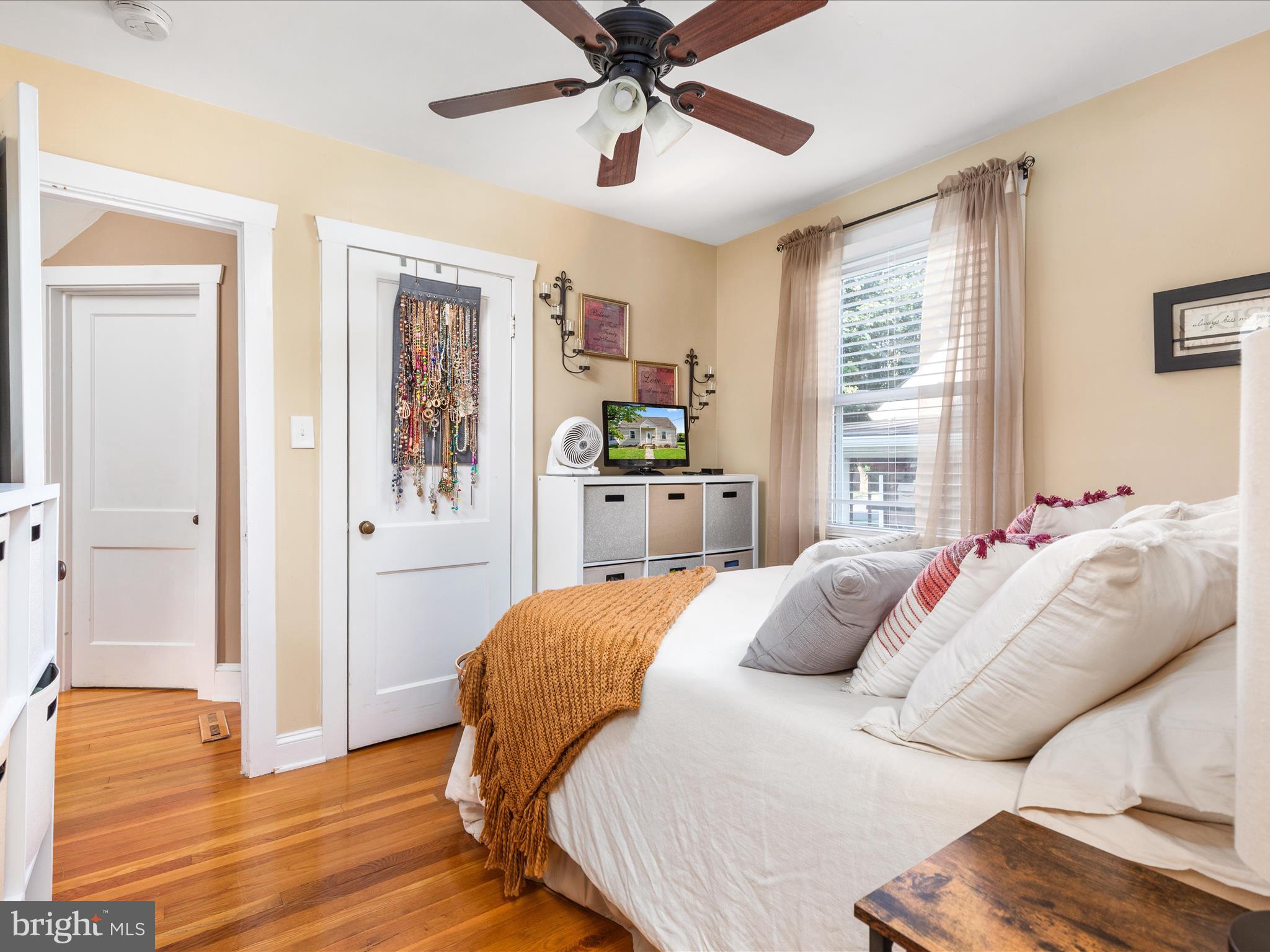 702 Braxton Road Front Royal, VA 22630 - Photo 19 of 61 a bedroom with a bed and wooden floor