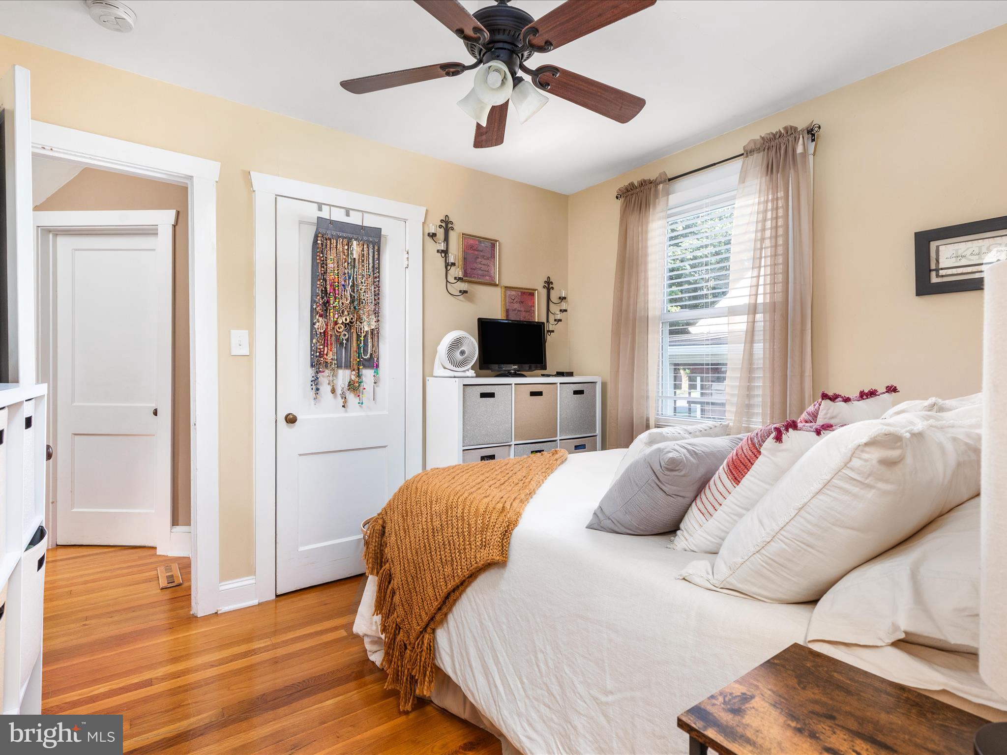 702 Braxton Road Front Royal, VA 22630 - Photo 20 of 61 a bedroom with a bed flat screen tv and a window