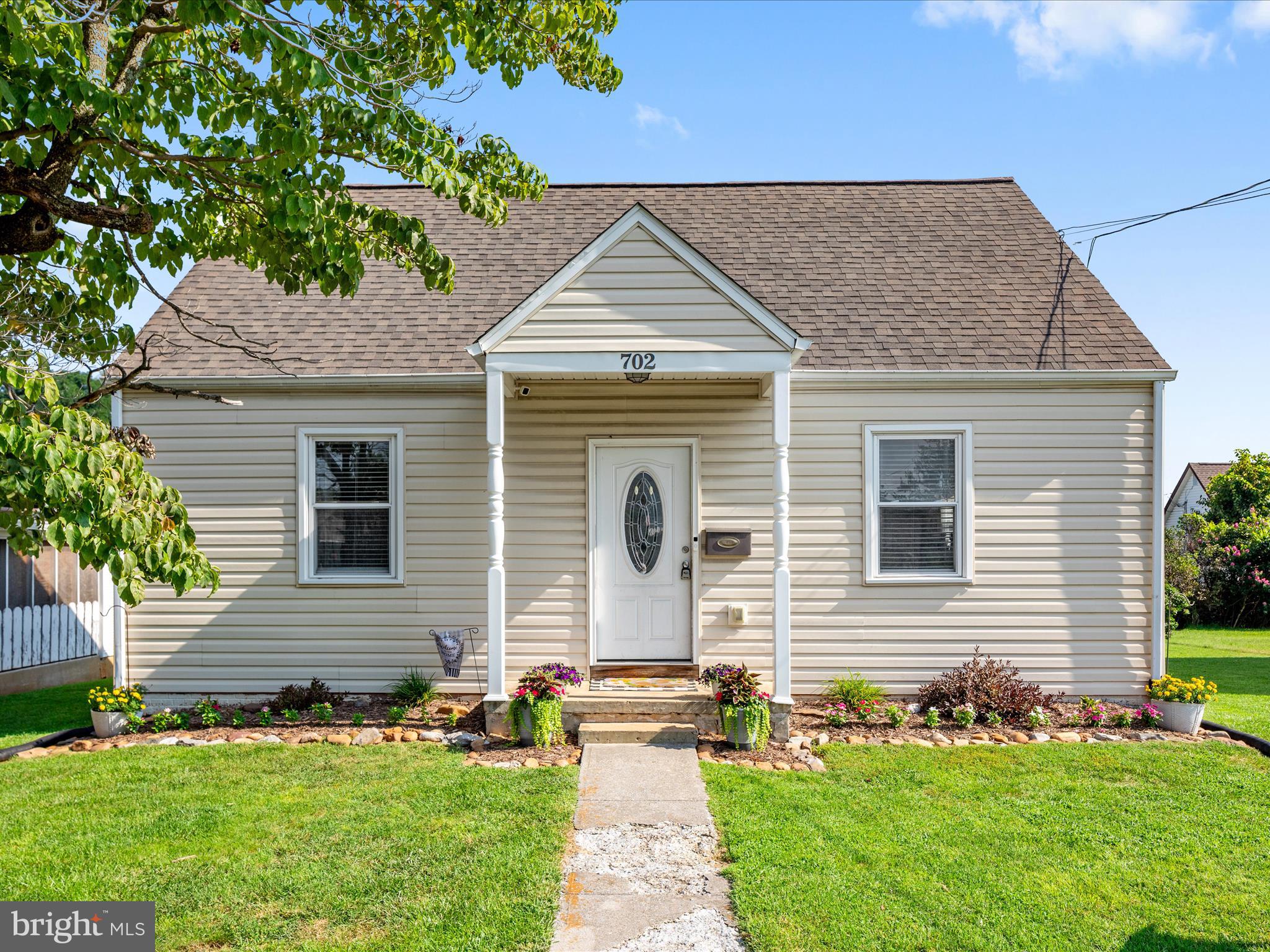 702 Braxton Road Front Royal, VA 22630 - Photo 2 of 61 a front view of a house with a yard