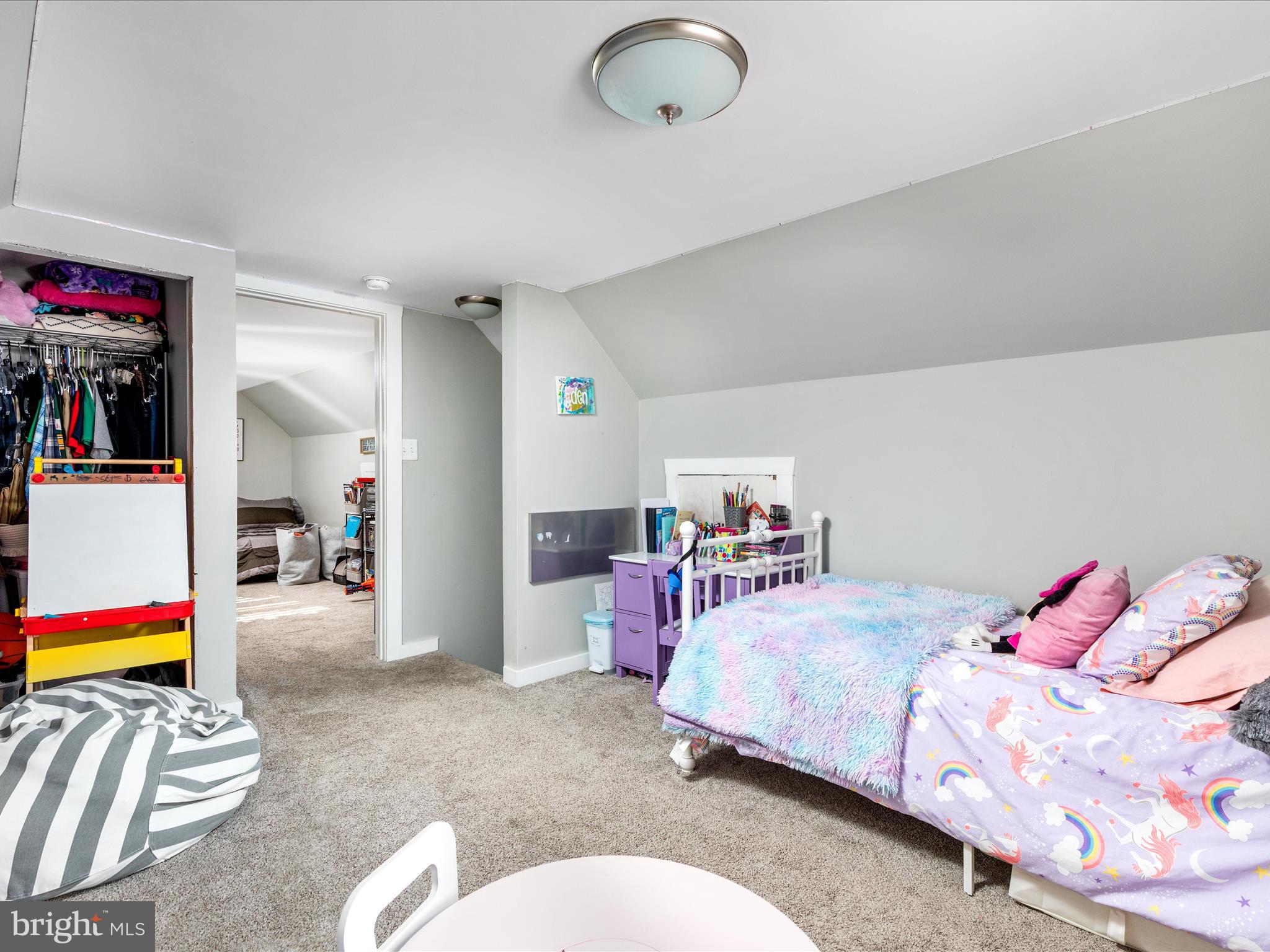702 Braxton Road Front Royal, VA 22630 - Photo 26 of 61 a bedroom with bed and glass door