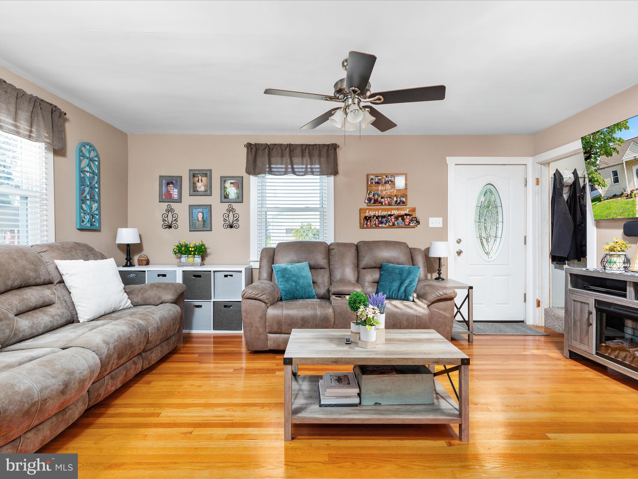 702 Braxton Road Front Royal, VA 22630 - Photo 7 of 61 a living room with furniture and a wooden floor