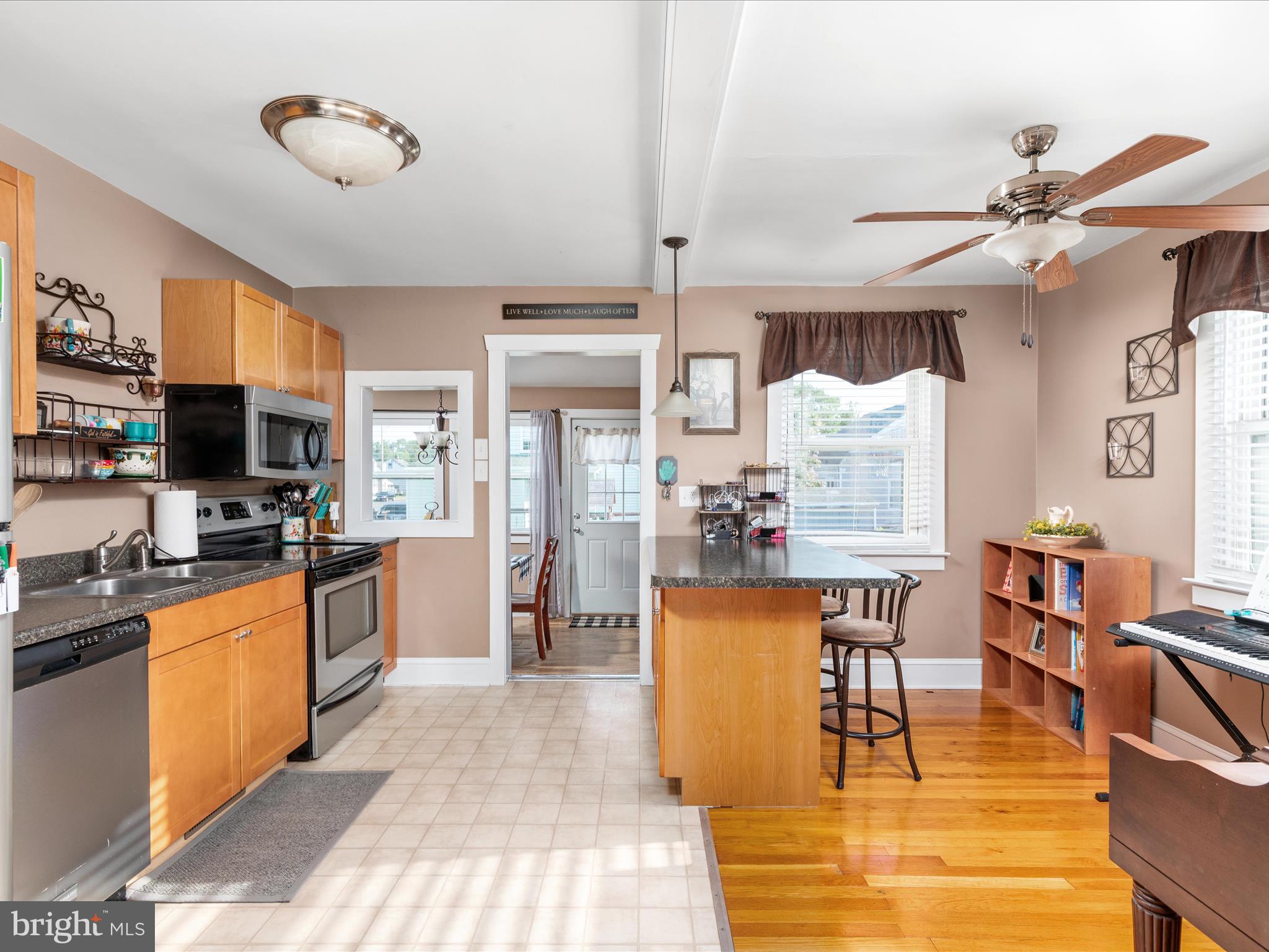 702 Braxton Road Front Royal, VA 22630 - Photo 9 of 61 a living room with fireplace furniture and a flat screen tv