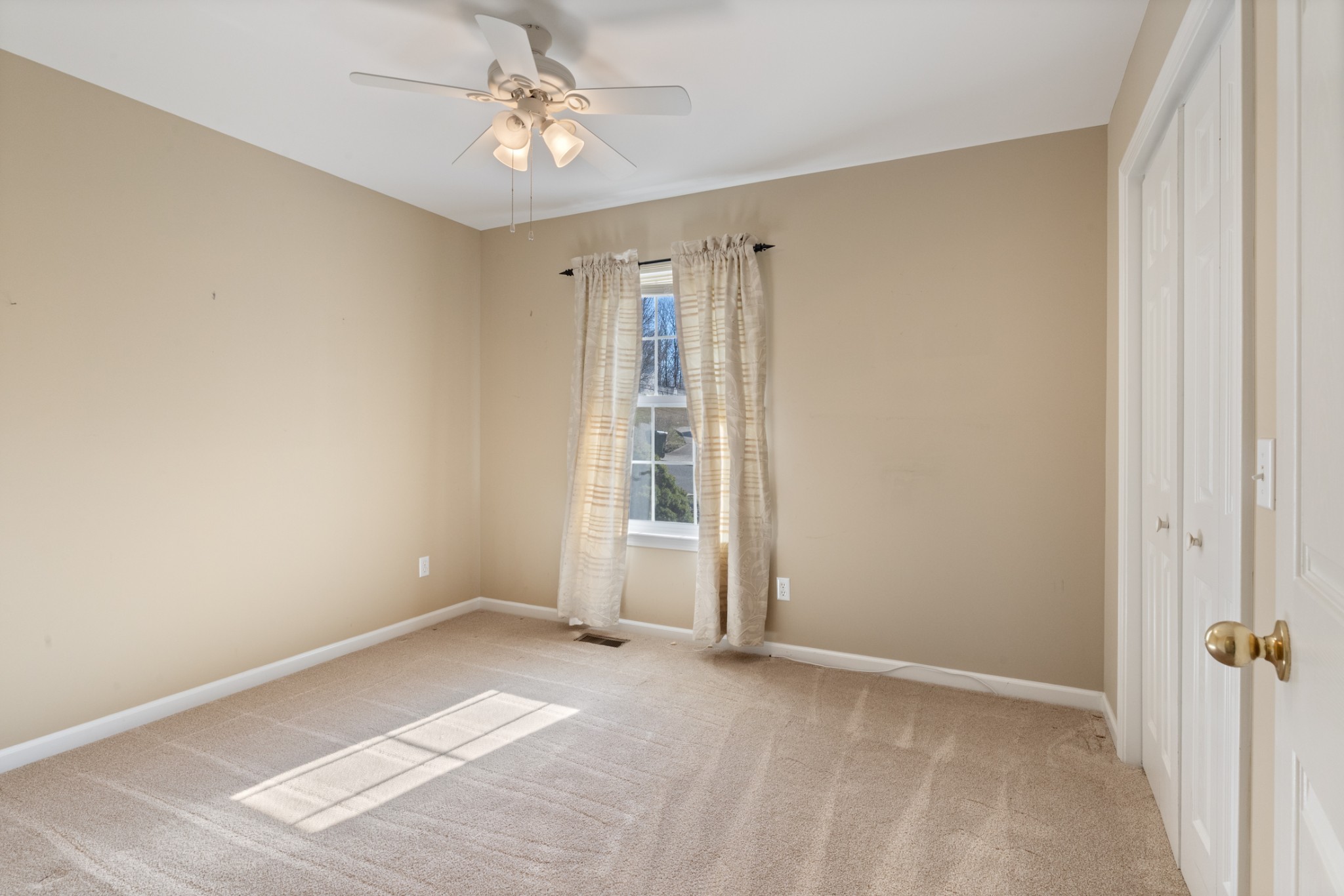 101 Garden View Court Dickson, TN 37055 - Photo 11 of 33 a view of an empty room with a window
