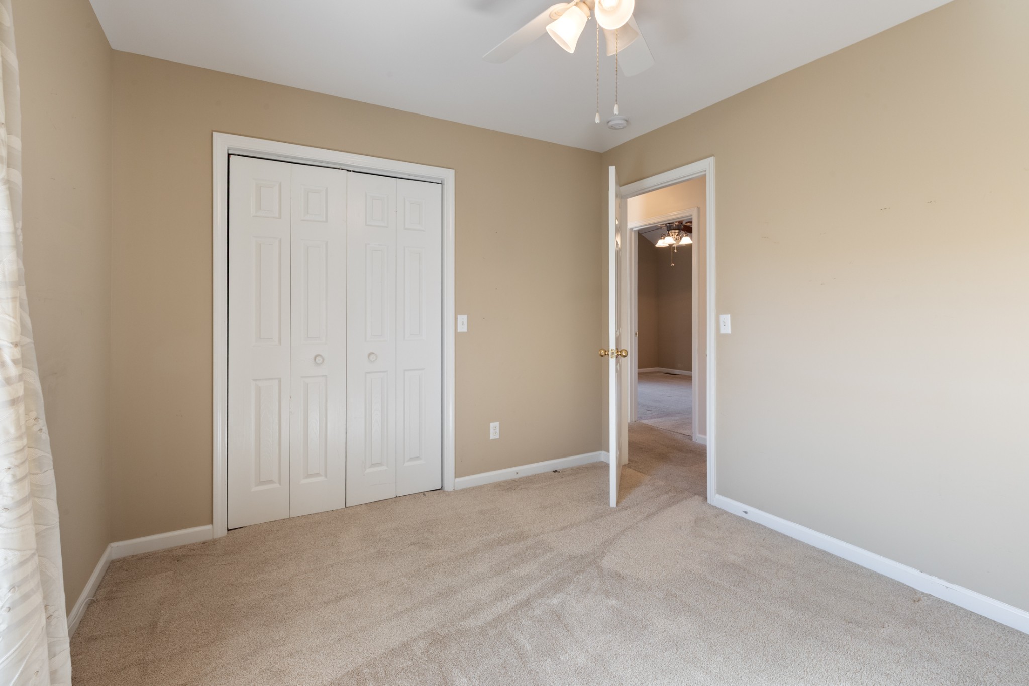 101 Garden View Court Dickson, TN 37055 - Photo 12 of 33 an empty room with chandelier fan