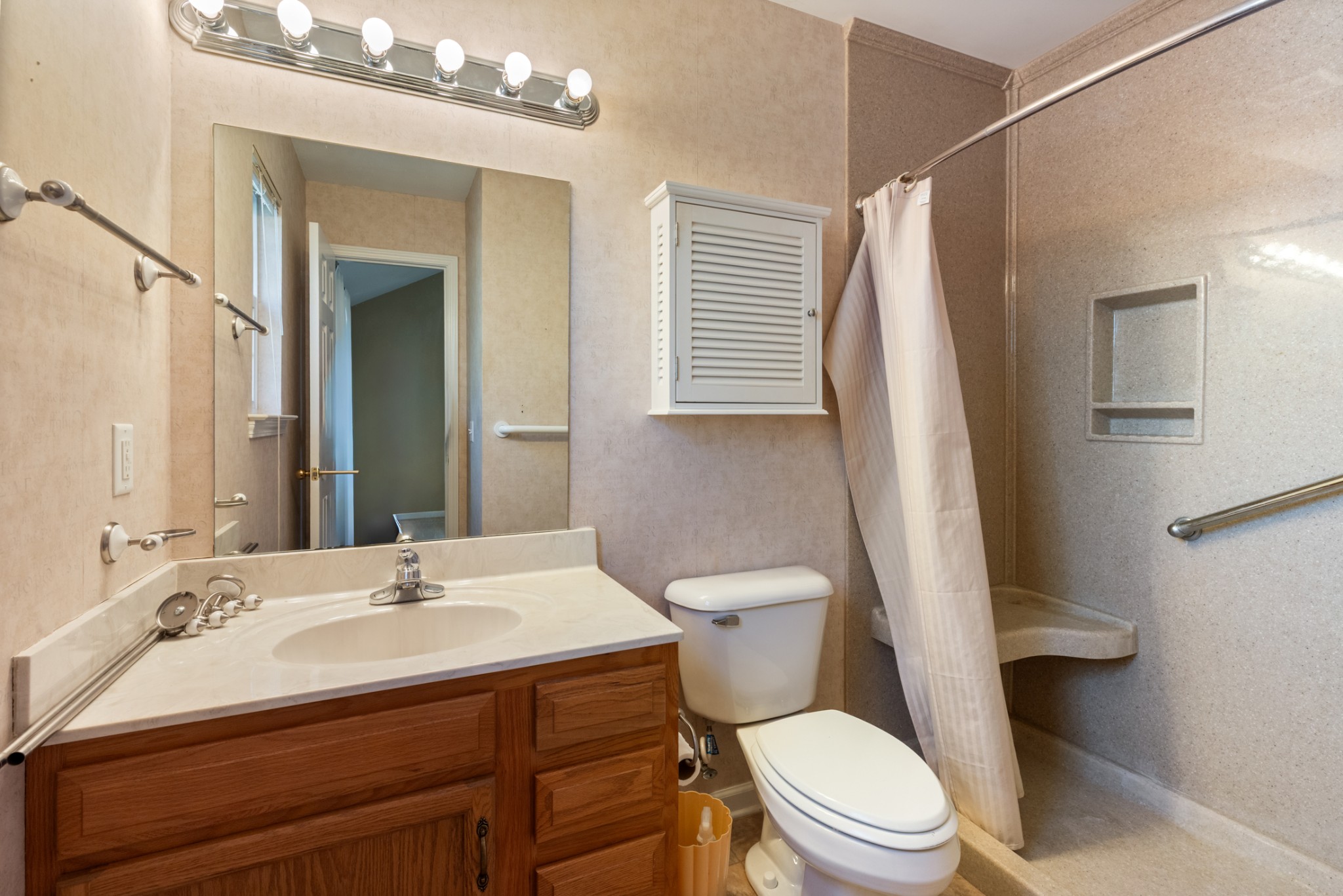 101 Garden View Court Dickson, TN 37055 - Photo 15 of 33 a bathroom with a sink a toilet a mirror and shower