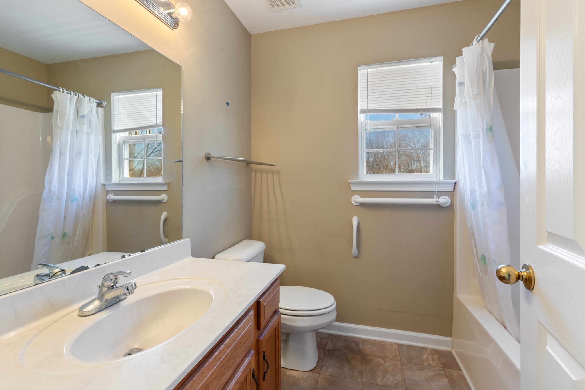 101 Garden View Court Dickson, TN 37055 - Photo 16 of 33 a bathroom with a sink toilet and shower