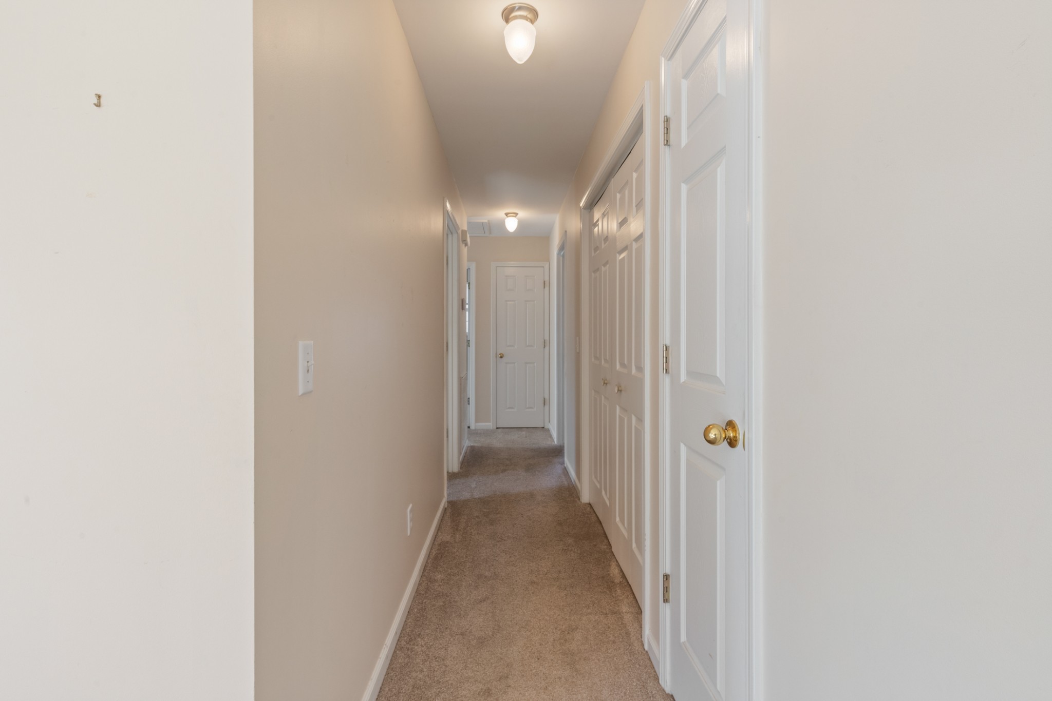 101 Garden View Court Dickson, TN 37055 - Photo 19 of 33 a view of a hallway with wooden floor