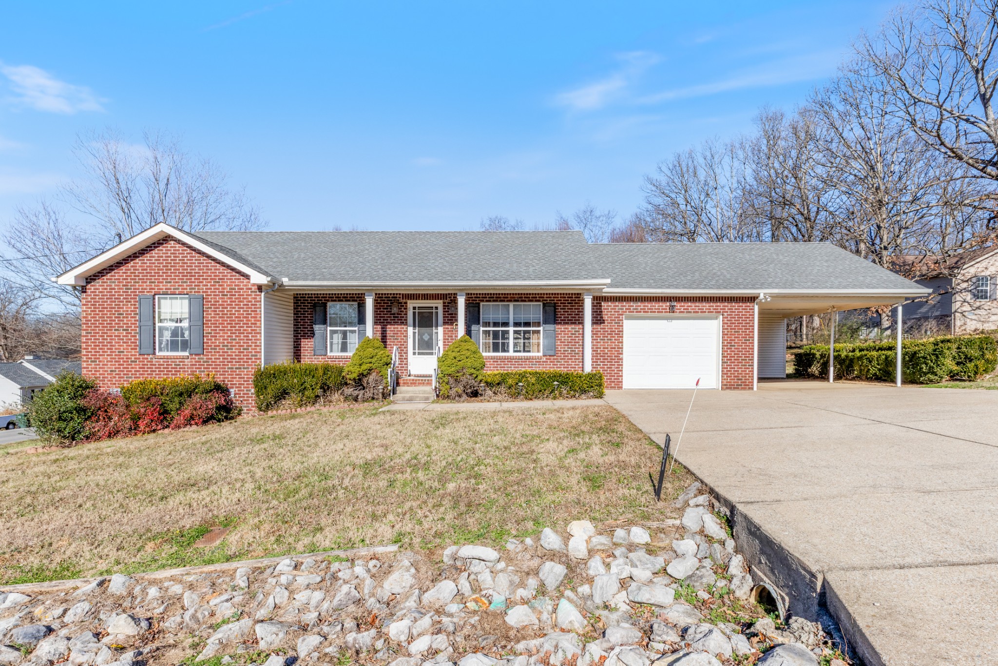 101 Garden View Court Dickson, TN 37055 - Photo 2 of 33 a front view of a house with a yard