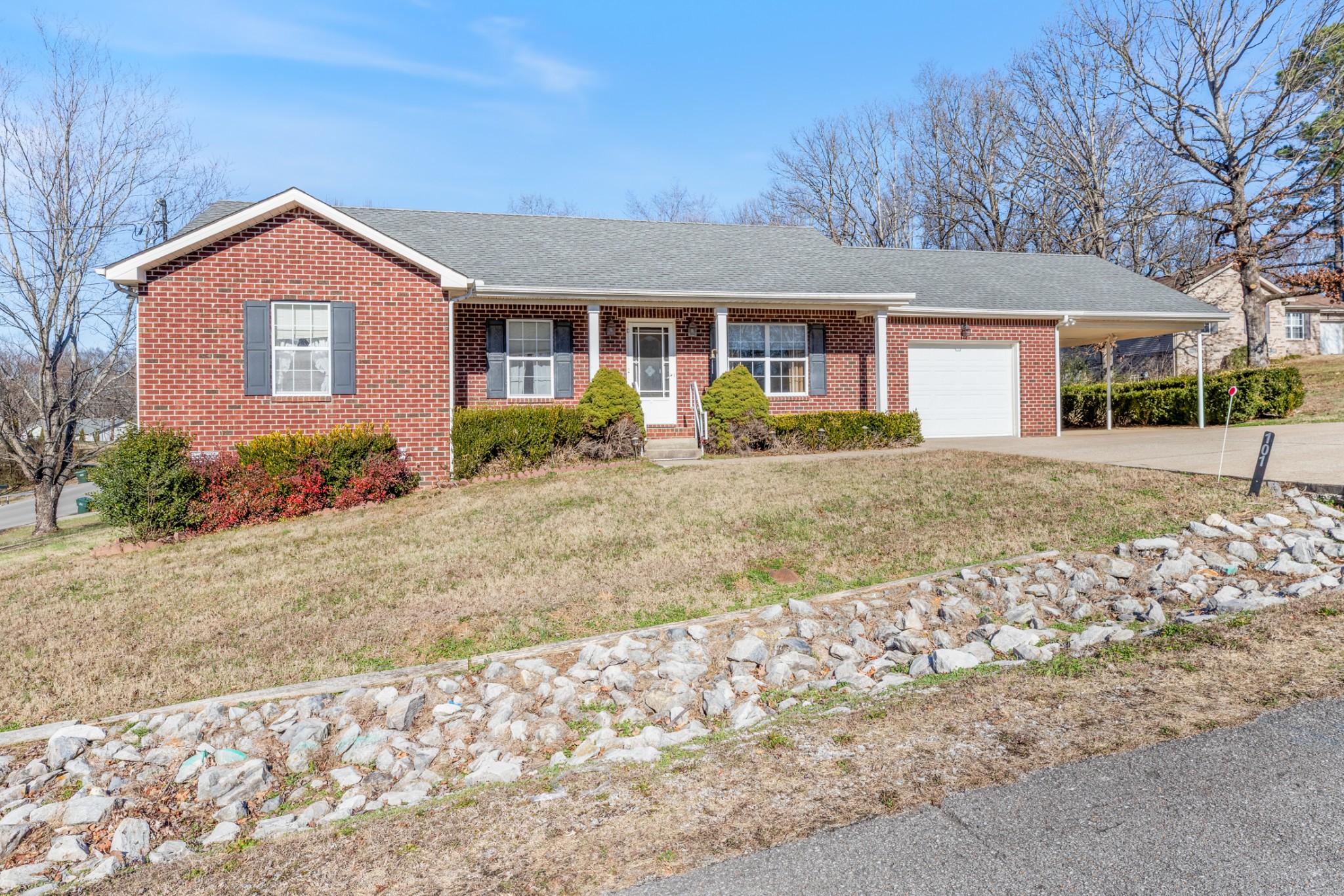 101 Garden View Court Dickson, TN 37055 - Photo 3 of 33 front view of a house with a yard