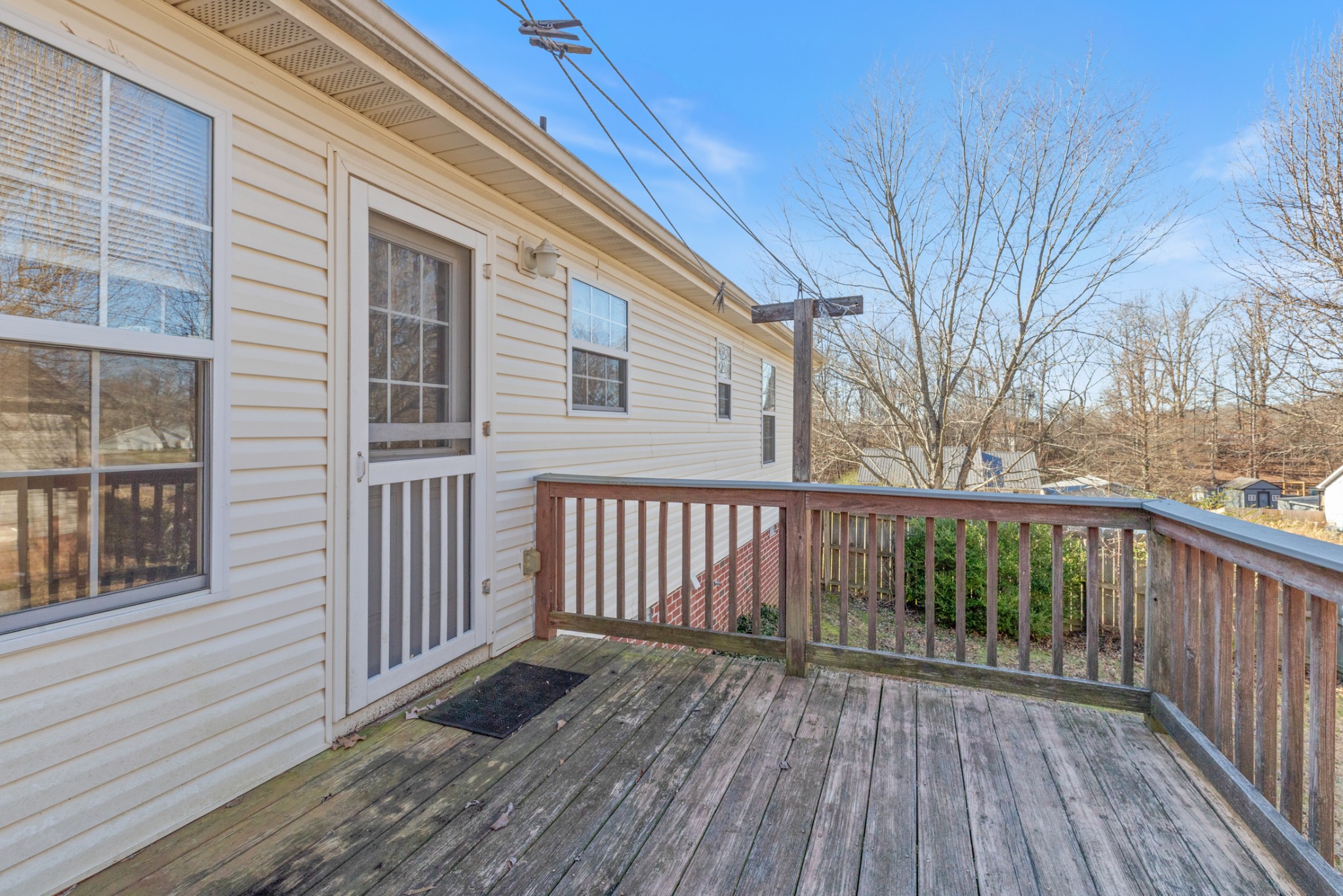 101 Garden View Court Dickson, TN 37055 - Photo 32 of 33 a view of a wooden roof deck