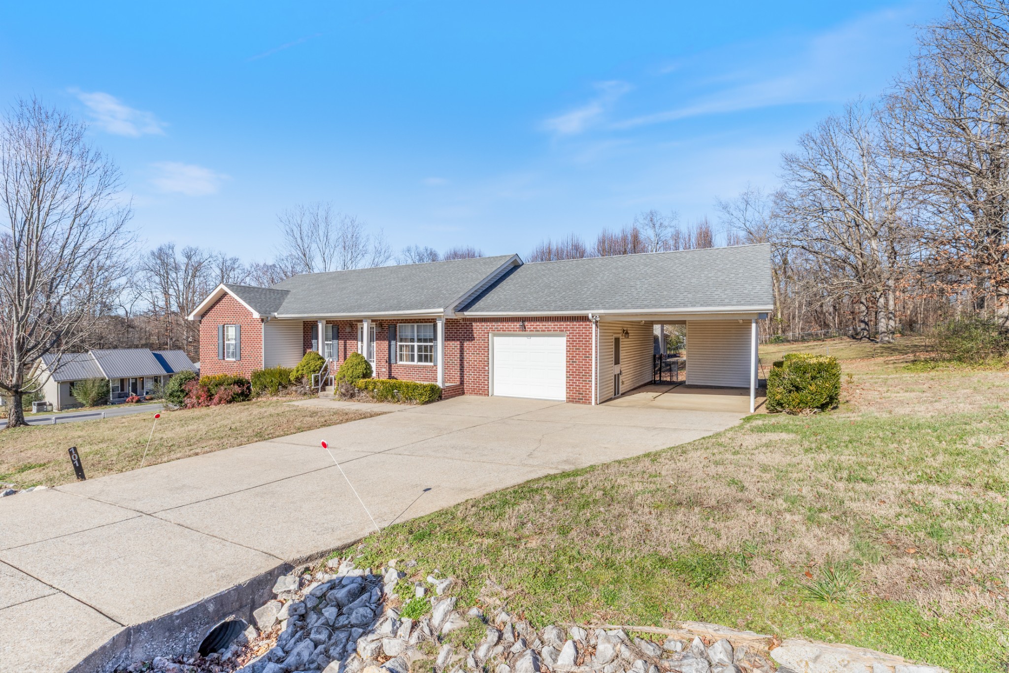 101 Garden View Court Dickson, TN 37055 - Photo 4 of 33 a front view of a house with a yard