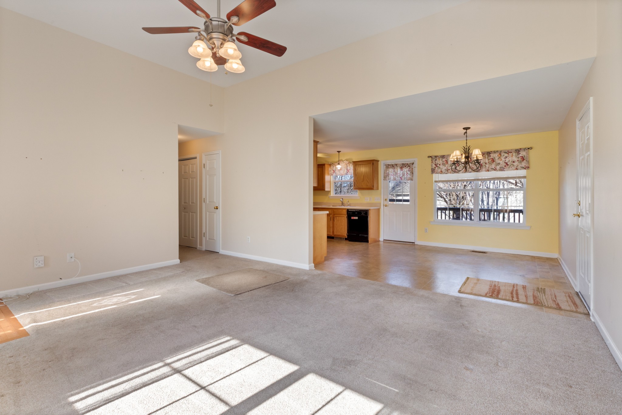 101 Garden View Court Dickson, TN 37055 - Photo 8 of 33 an empty room with windows and ceiling fan