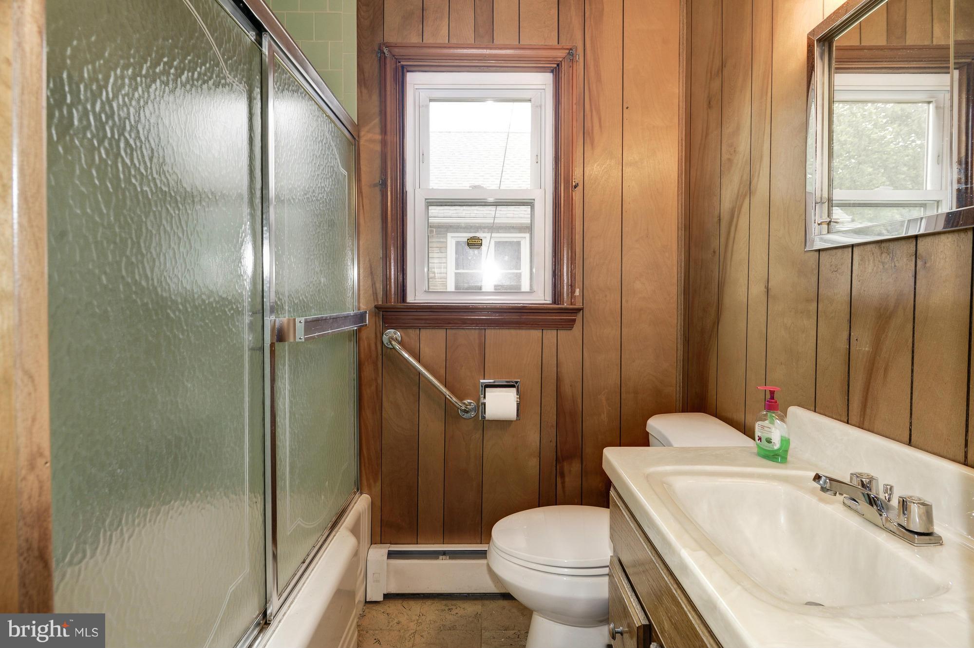 307 Charles Road Linthicum, MD 21090 - Photo 14 of 30 a bathroom with a sink toilet and shower