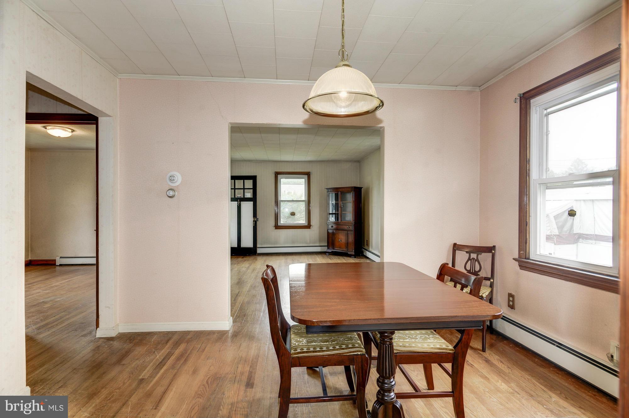 307 Charles Road Linthicum, MD 21090 - Photo 3 of 30 a view of a dining room with furniture and window