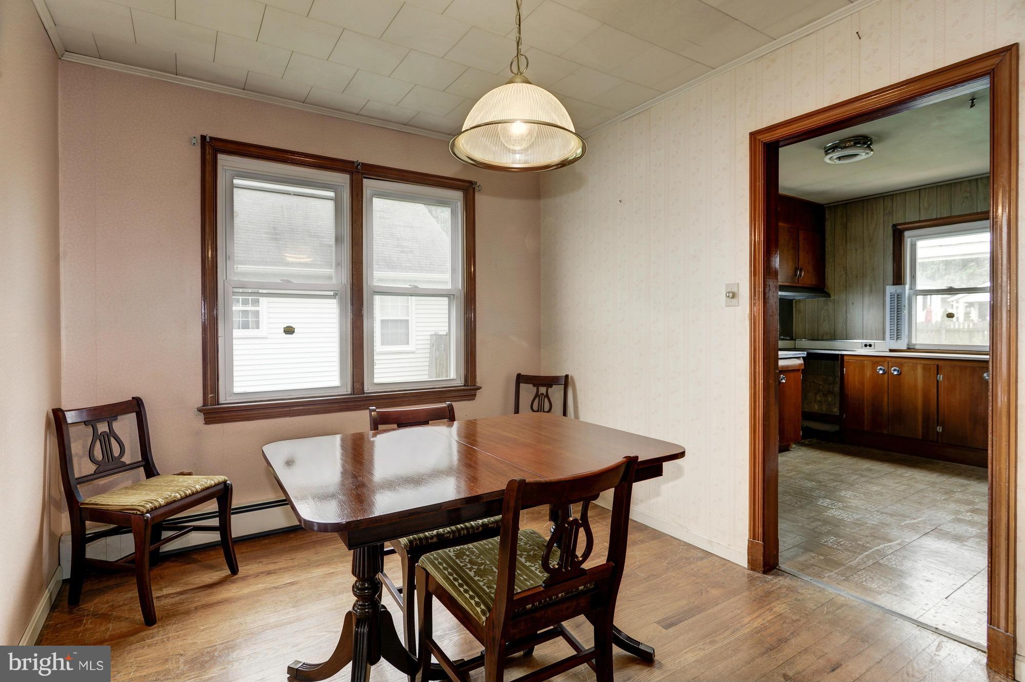 307 Charles Road Linthicum, MD 21090 - Photo 5 of 30 a view of a dining room with furniture and window