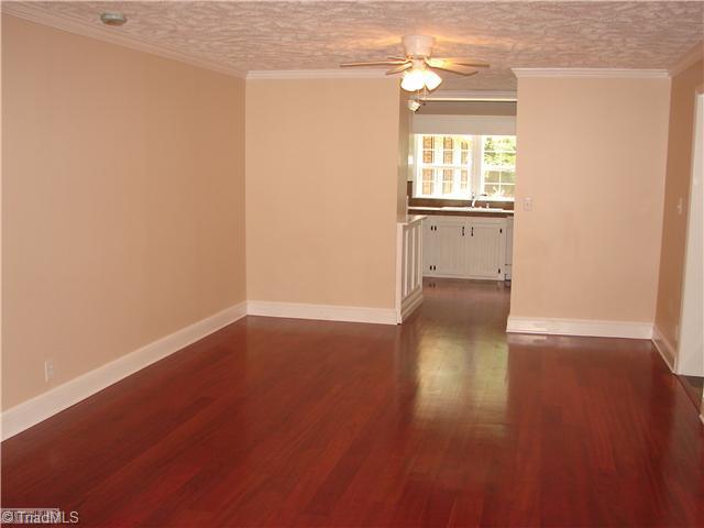 Living Room. Spacious Living Room with Gorgeous Cherry Hardwood Floor