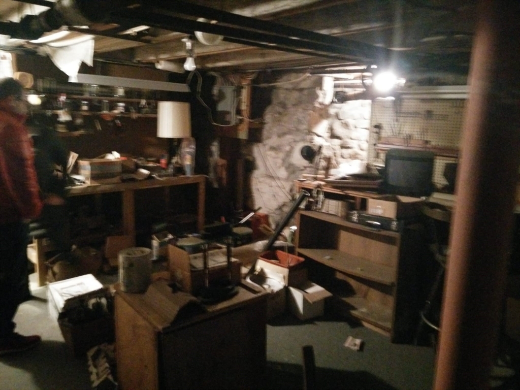 331 South Main Street Andover, MA 01810 - Photo 5 of 6 a room with water heater and wooden floor