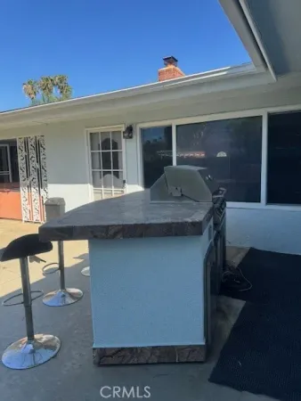 a view of house with outdoor space