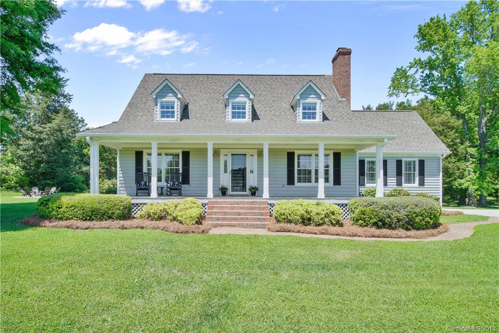 9049 Stacy Howie Road Indian Land, SC 29707 - Photo 1 of 36 a front view of a house with a yard