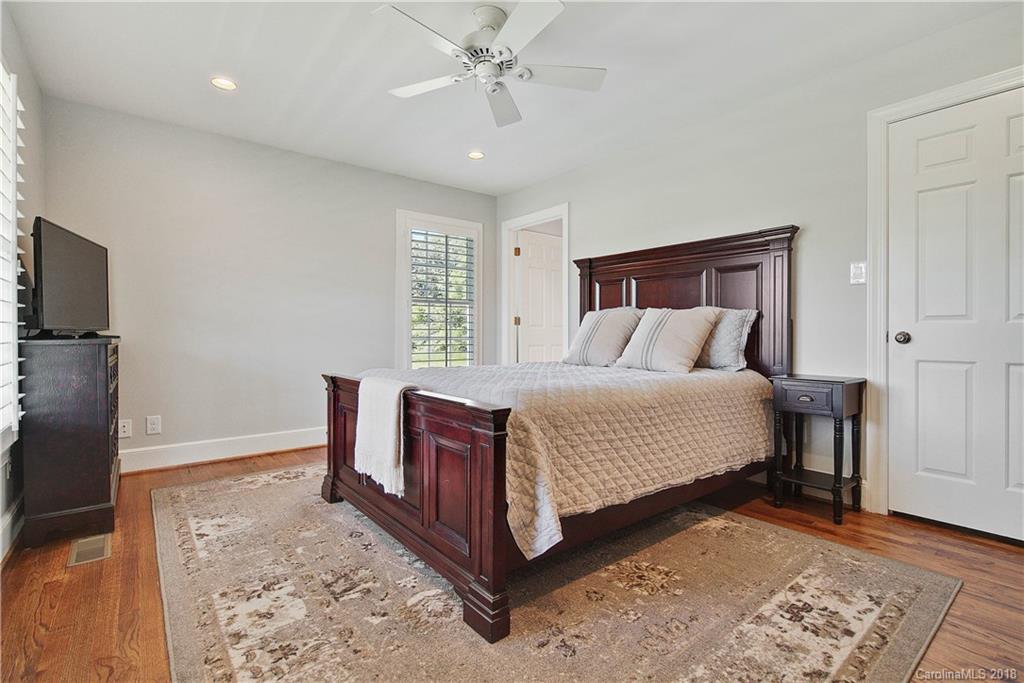 9049 Stacy Howie Road Indian Land, SC 29707 - Photo 20 of 36 a bedroom with a bed and a window