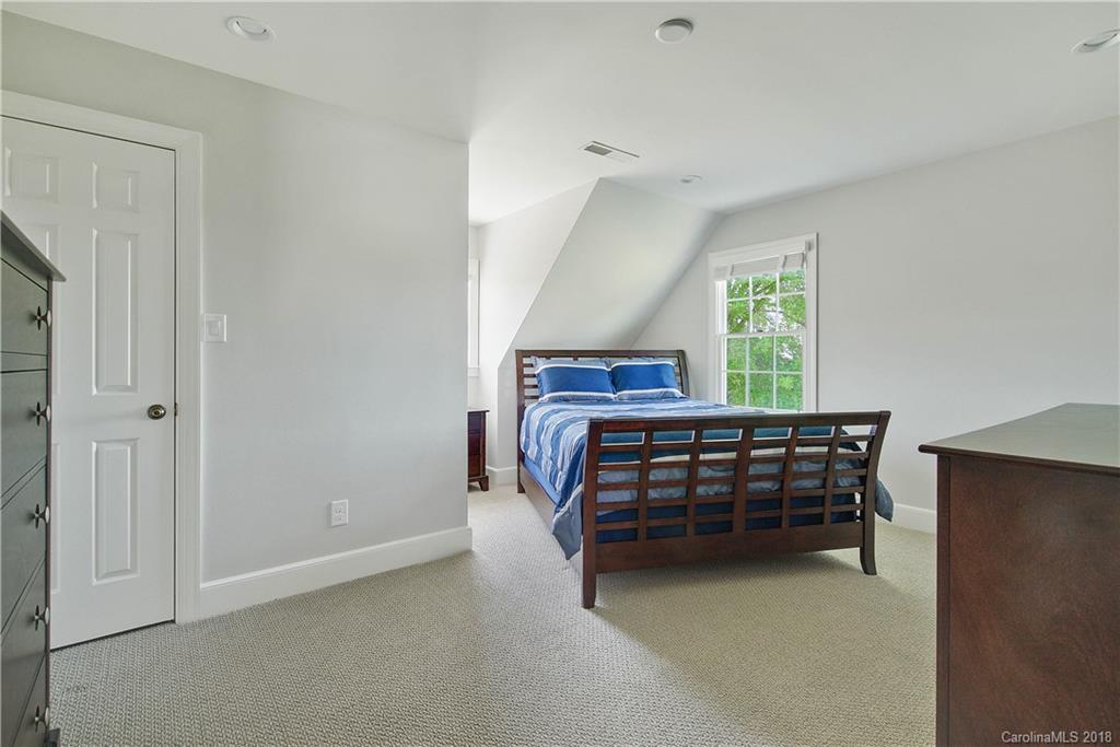 9049 Stacy Howie Road Indian Land, SC 29707 - Photo 25 of 36 a bedroom with furniture and window