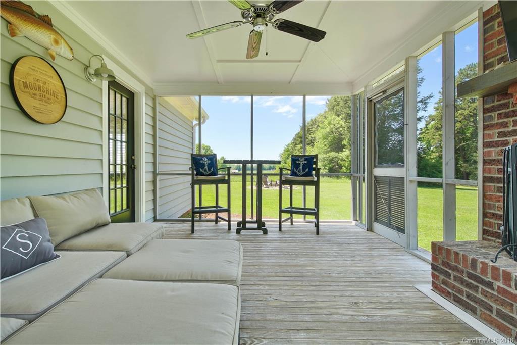 9049 Stacy Howie Road Indian Land, SC 29707 - Photo 31 of 36 a view of a patio with a swimming pool